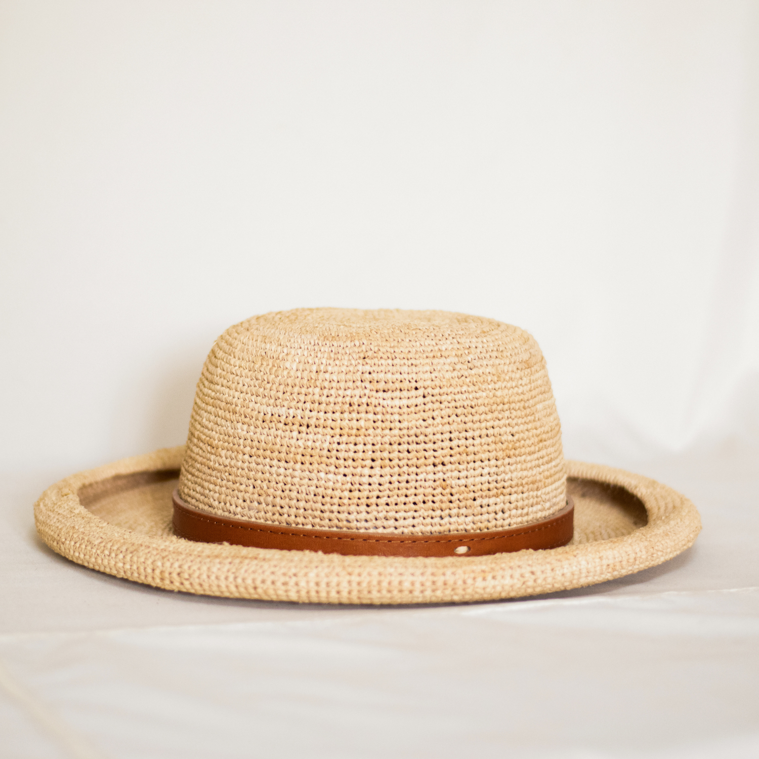Rolled brim straw hat